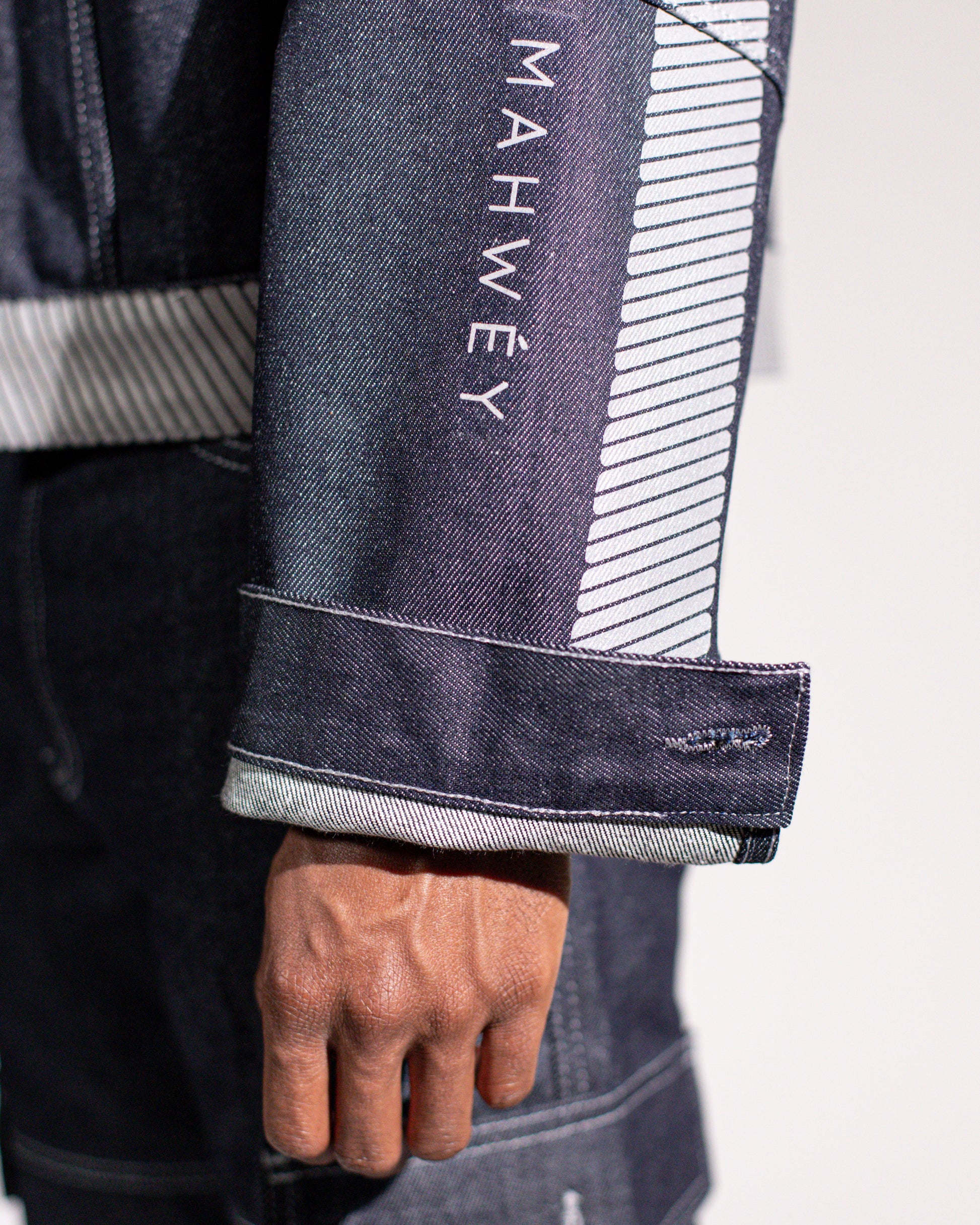 MAHWÉY logo on men's denim jacket