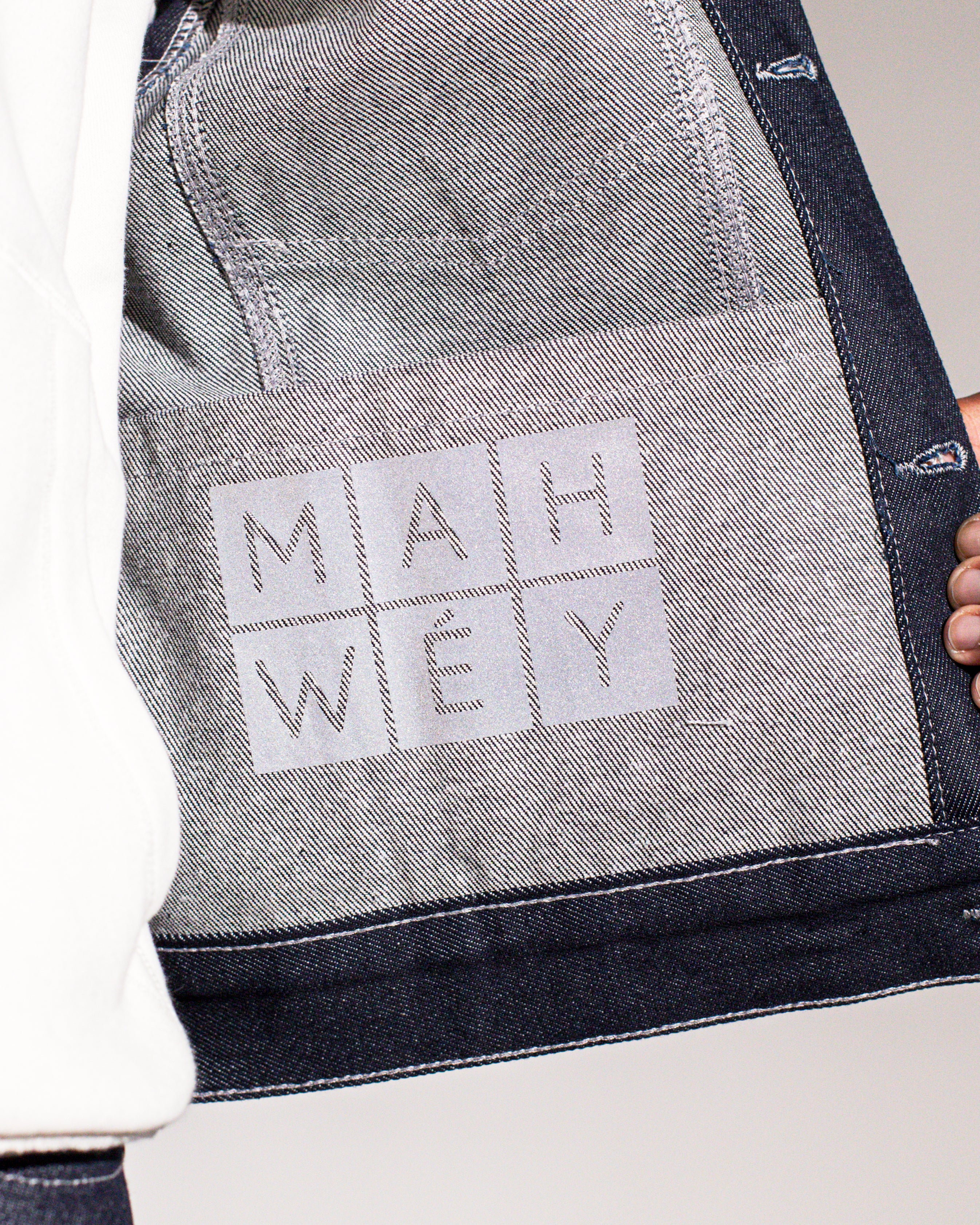 MAHWÉY logo in raw denim jacket